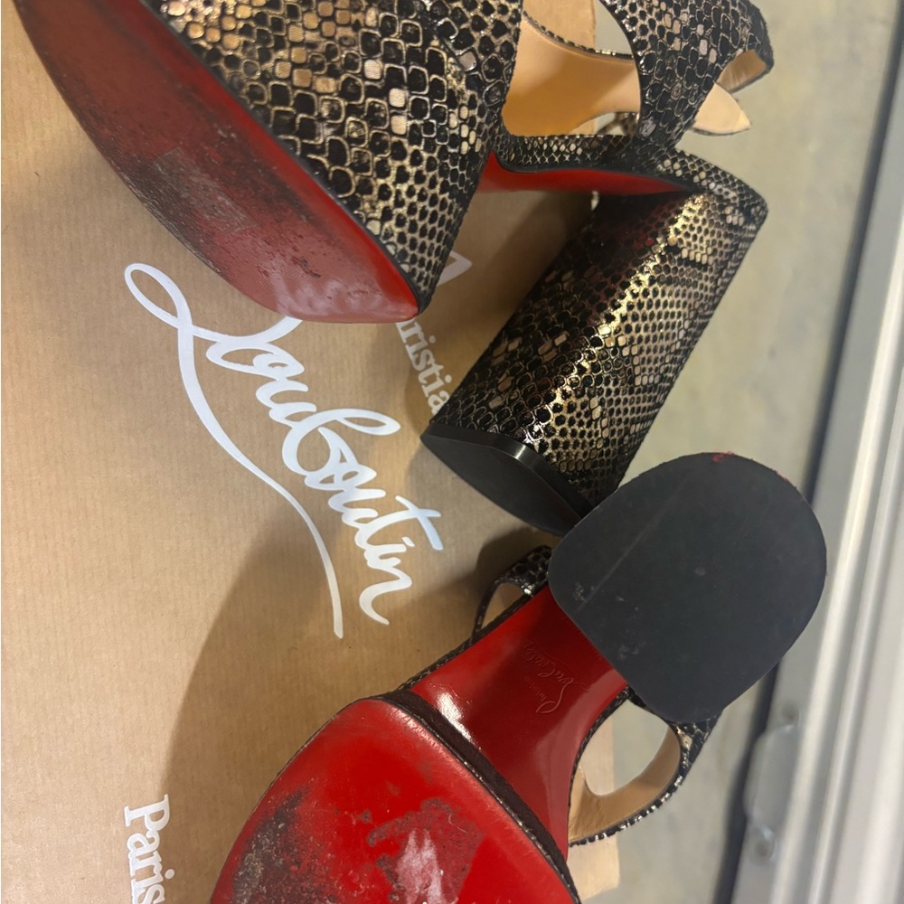 Christian Louboutin Black and Gold Stiletto Heels